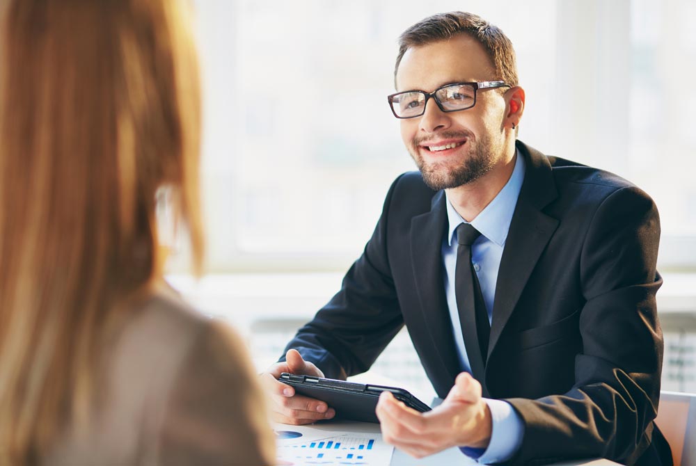 man in business attire during meeting