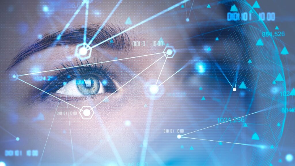 Close-up of a human eye overlaid with futuristic digital graphics, data points, and network connections, symbolizing vision, innovation, and the integration of technology in leadership development.